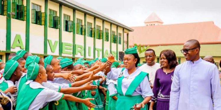 Anambra Commissioner For Education Visits Alma Mater In School Uniform.
