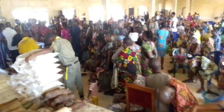 Easter: Anambra Bishop shares food items to Over 500 Indigents
