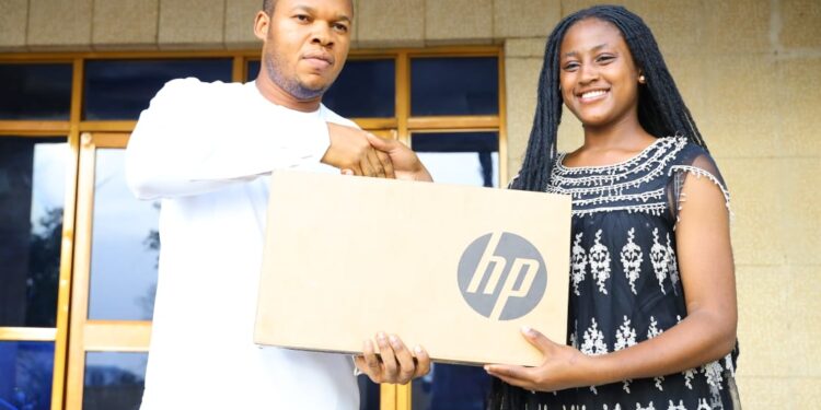Just-In: Fadaella Foods Ltd Presents Laptop to Overall Best Student in 2023 NECO Exam, Ifebube Benson